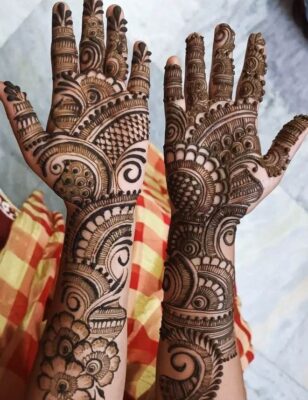 Full Hand Mehndi Design covers the entire hand with beautiful patterns