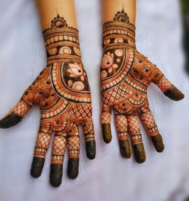 Full Hand Mehndi Design is admired for its detailed work