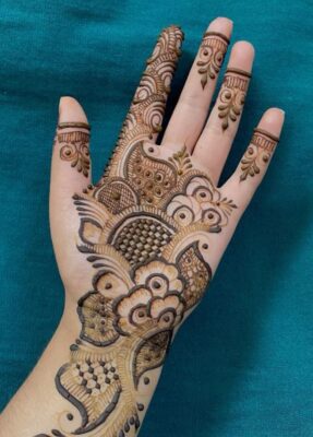 Mehndi Design enhances the beauty of hands and feet