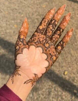 Mehndi Design often features floral and paisley motifs