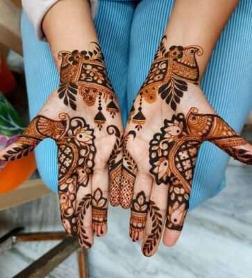 New Mehndi Design Photo includes floral and stylish patterns