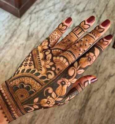 Stylish Back Hand Mehndi Design looks stunning in photos