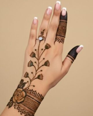 Stylish Back Hand Mehndi Design uses beautiful floral patterns
